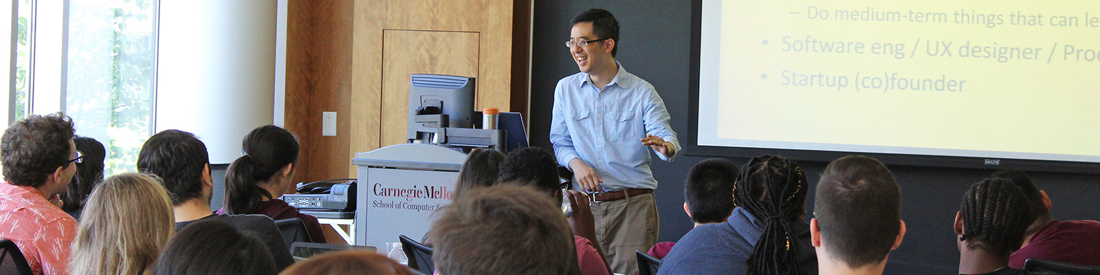 professor Jason Hong speaking in front of class