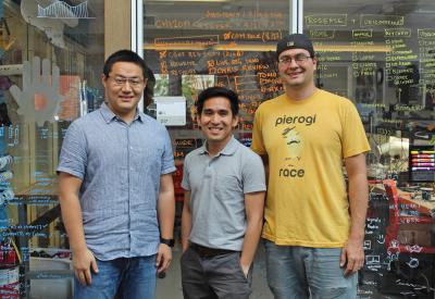 Guo, Laput and Taylor, the 3 Innovation Fellows from the HCII, stand side by side in the lab