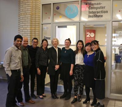 group of METALS students and their corporate sponsors stand outside of the HCII lobby