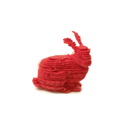 A small red bunny printed using layers of fabric.