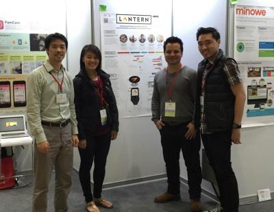 MHCI students standing in front of their Lantern poster at CHI.