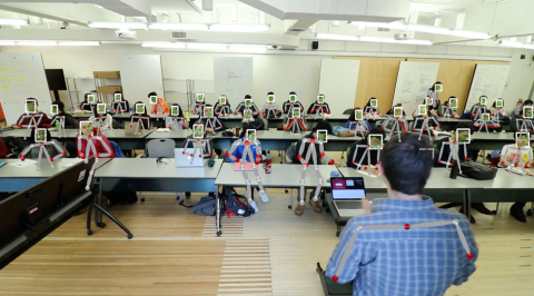 teacher's view of 3 wide rows students and desks from the front of the classroom with the Class In Sight technology overlay