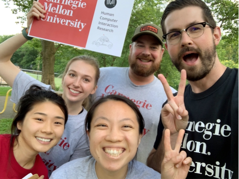 the 5 students on team 99P labs take a selfie outdoors