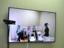 screen showing classroom scene with insights overlayed around students and teacher