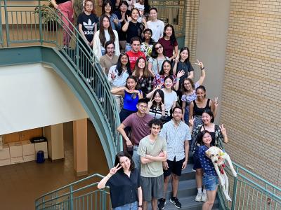 group photo of the 2022 summer researchers on the stairs in the NSH atrium
