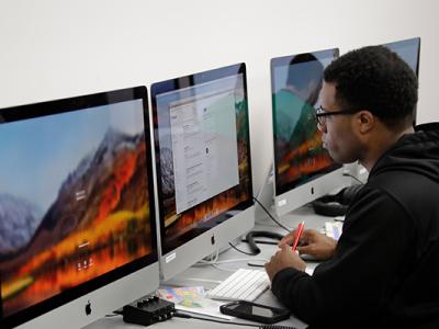 SCS faculty members are part of a CMU team that received an NSF Future of Work grant to investigate how AI-augmented learning can help accelerate student progress in community college IT courses. (Photo courtesy of CCAC.)