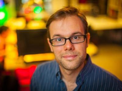 HCII faculty member Chris Harrison earned the UIST Lasting Impact Award for his 2011 work on OmniTouch, a wearable system that turns everyday surfaces into an interactive screen.