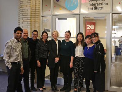 group of METALS students and their corporate sponsors stand outside of the HCII lobby