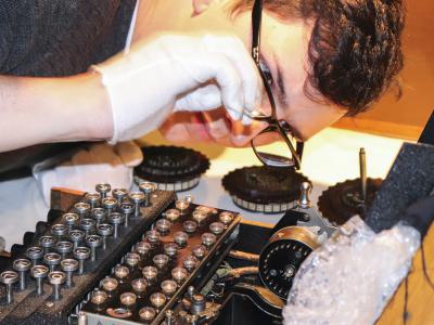Sven Mayer looks inside an Enigma machine
