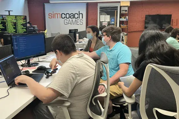 CMU and Simcoach Games have teamed up to give high school students interested in game design on-the-job training and a first step toward a career in the field. (Photo courtesy of Simcoach Games.)