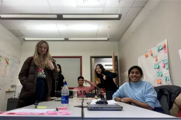 team members in their capstone room