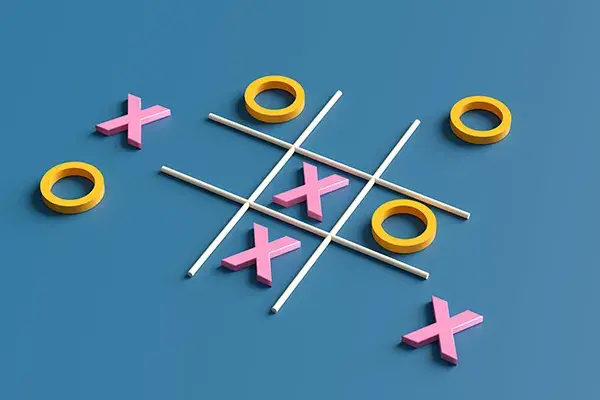 a tic tac toe board during mid-game on a grey background, the pieces are shaped like the pink letter X and a yellow letter 0