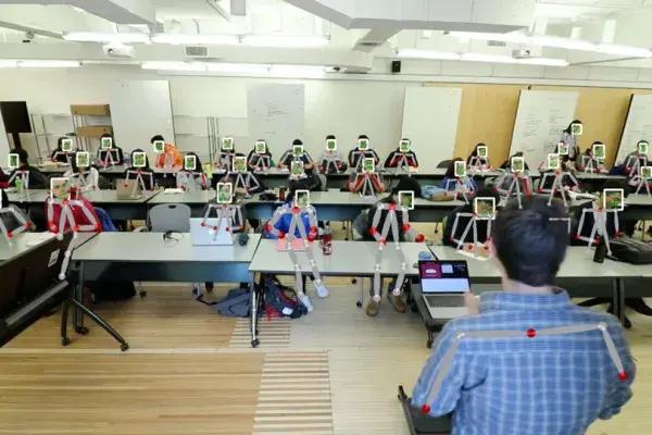 teacher's view of 3 wide rows students and desks from the front of the classroom with the Class In Sight technology overlay