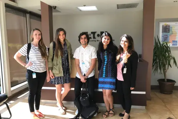 Morgan, Emily, Cameron, Aishwarya, and Deepika visit the Eaton office