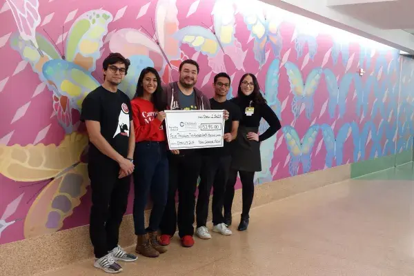 HCII students and faculty present fundraising check to UPMC Children's Hospital