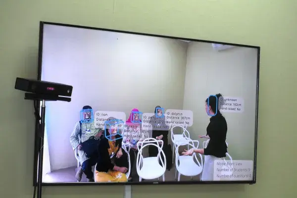 screen showing classroom scene with insights overlayed around students and teacher