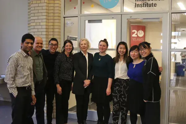 group of METALS students and their corporate sponsors stand outside of the HCII lobby