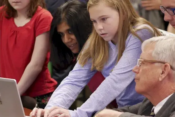 Students working on computer